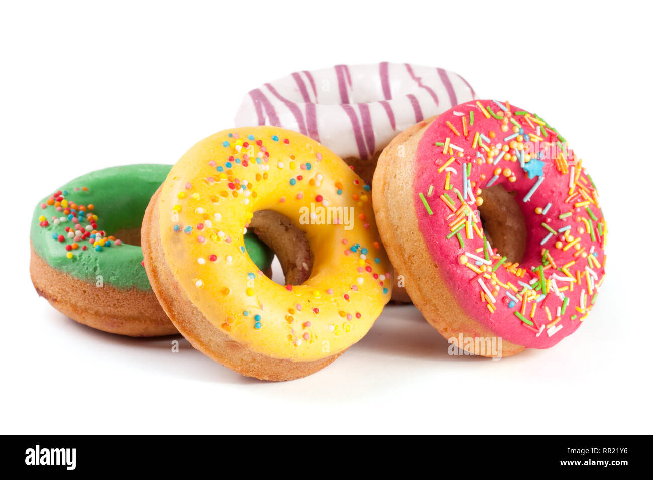 pile of glazed donuts isolated on white background Stock Photo - Alamy