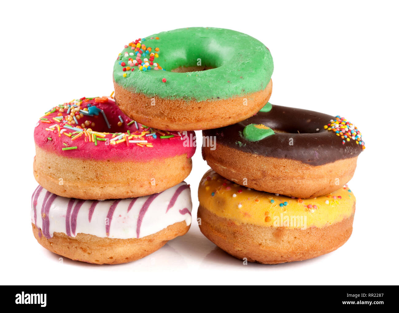 pile of glazed donuts isolated on white background Stock Photo - Alamy