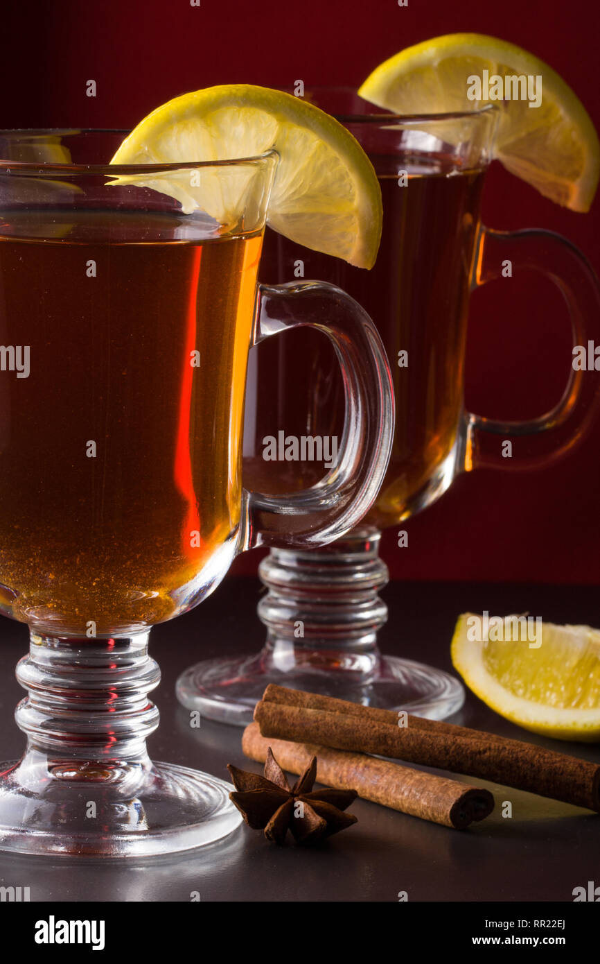 mulled wine with lemon on a dark background Stock Photo