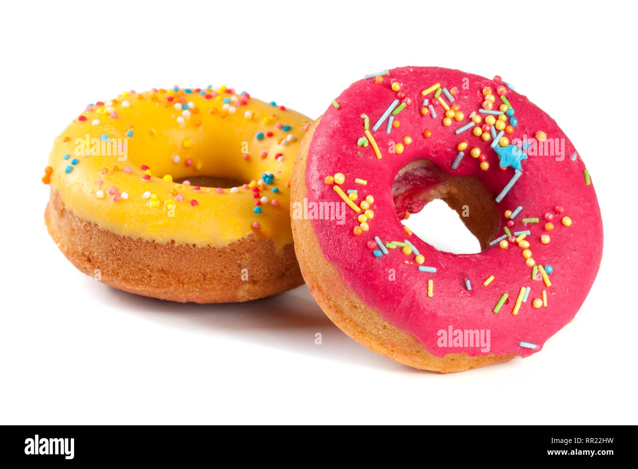 two glazed donut isolated on white background Stock Photo - Alamy