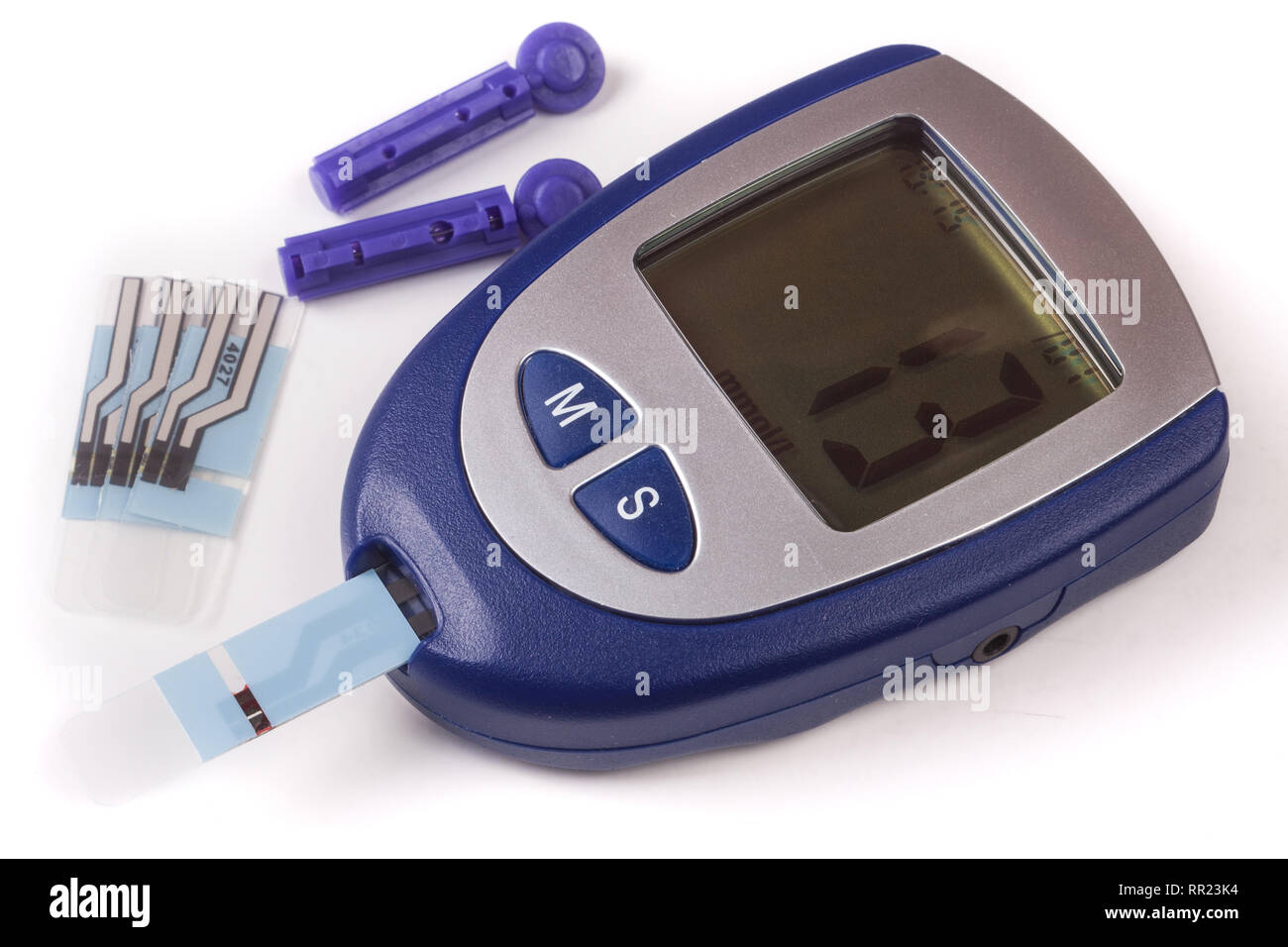 The blood glucose meter with test strips isolated on white background Stock Photo