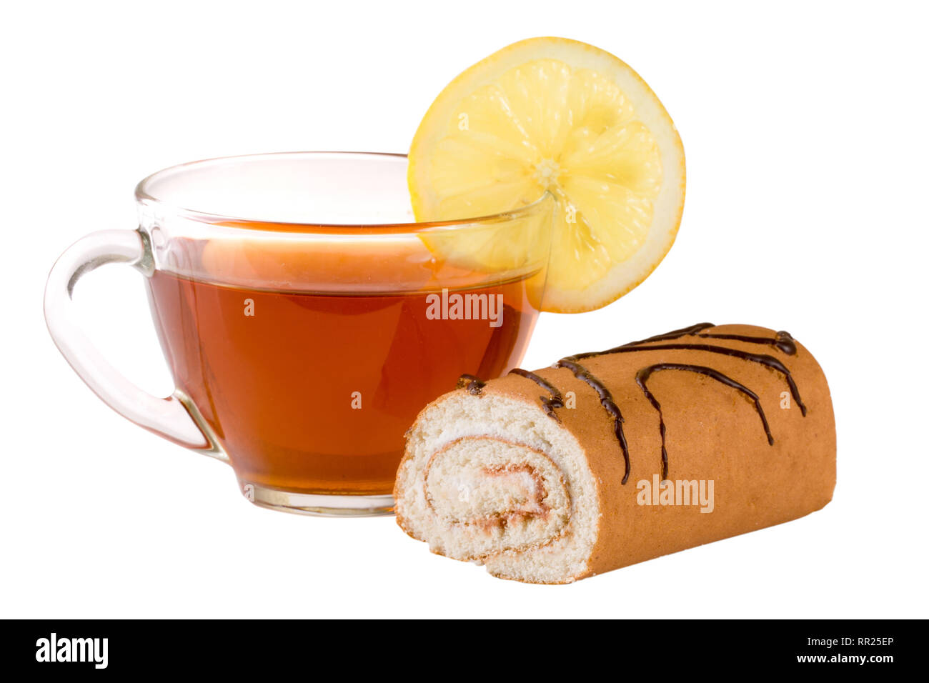 Biscuit roll with a cup of tea isolated on white background closeup ...