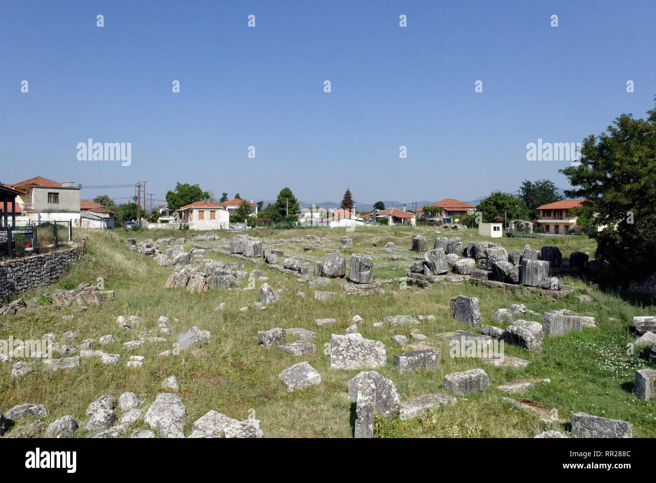 The ruins of the 4th century BC Temple of Athena Alea, Tegea, Peloponnese, Greece. Located in the ancient Arcadian city of Tegea, the all marble perip Stock Photo