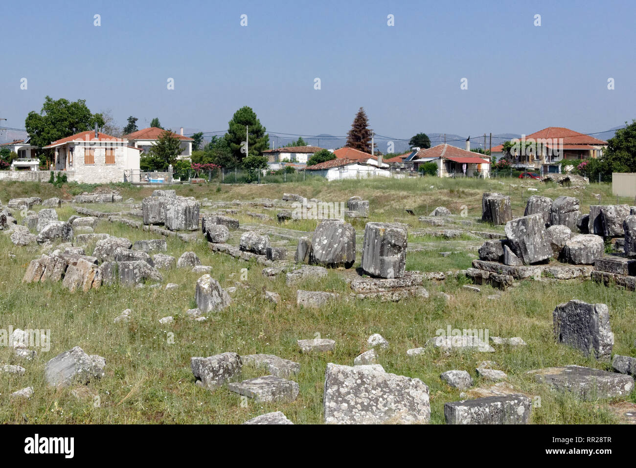 The ruins of the 4th century BC Temple of Athena Alea, Tegea, Peloponnese, Greece. Located in the ancient Arcadian city of Tegea, the all marble perip Stock Photo