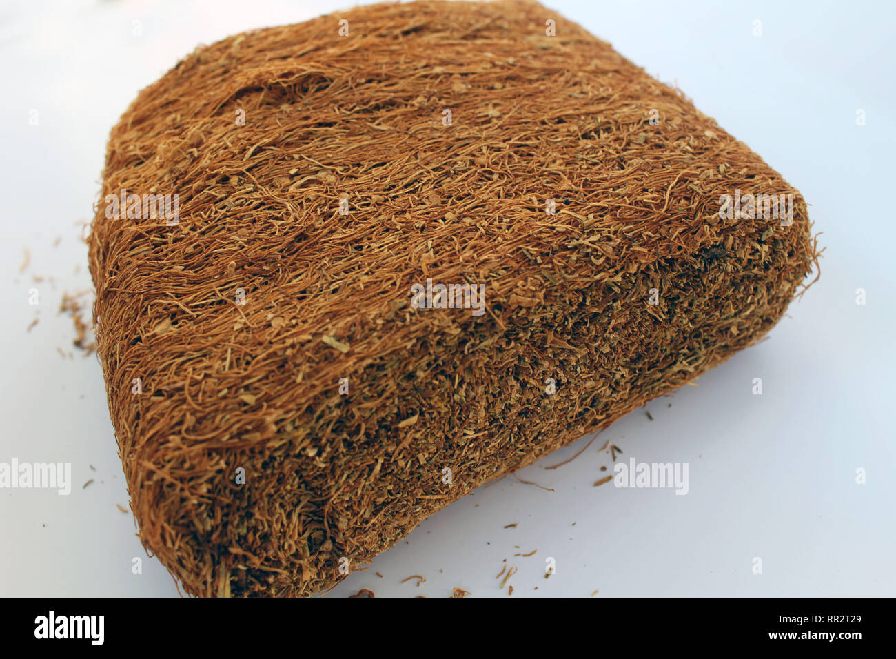 pressed tobacco A slice of pressed tobacco that grows in Indonesia. A closeup view Stock  Photo