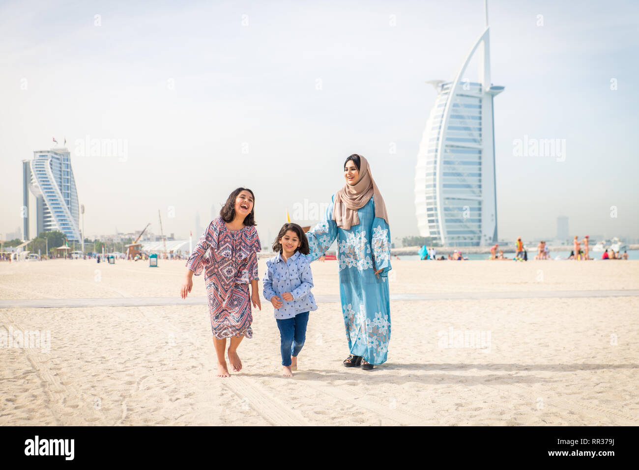 Dubai beach family hi-res stock photography and images - Alamy