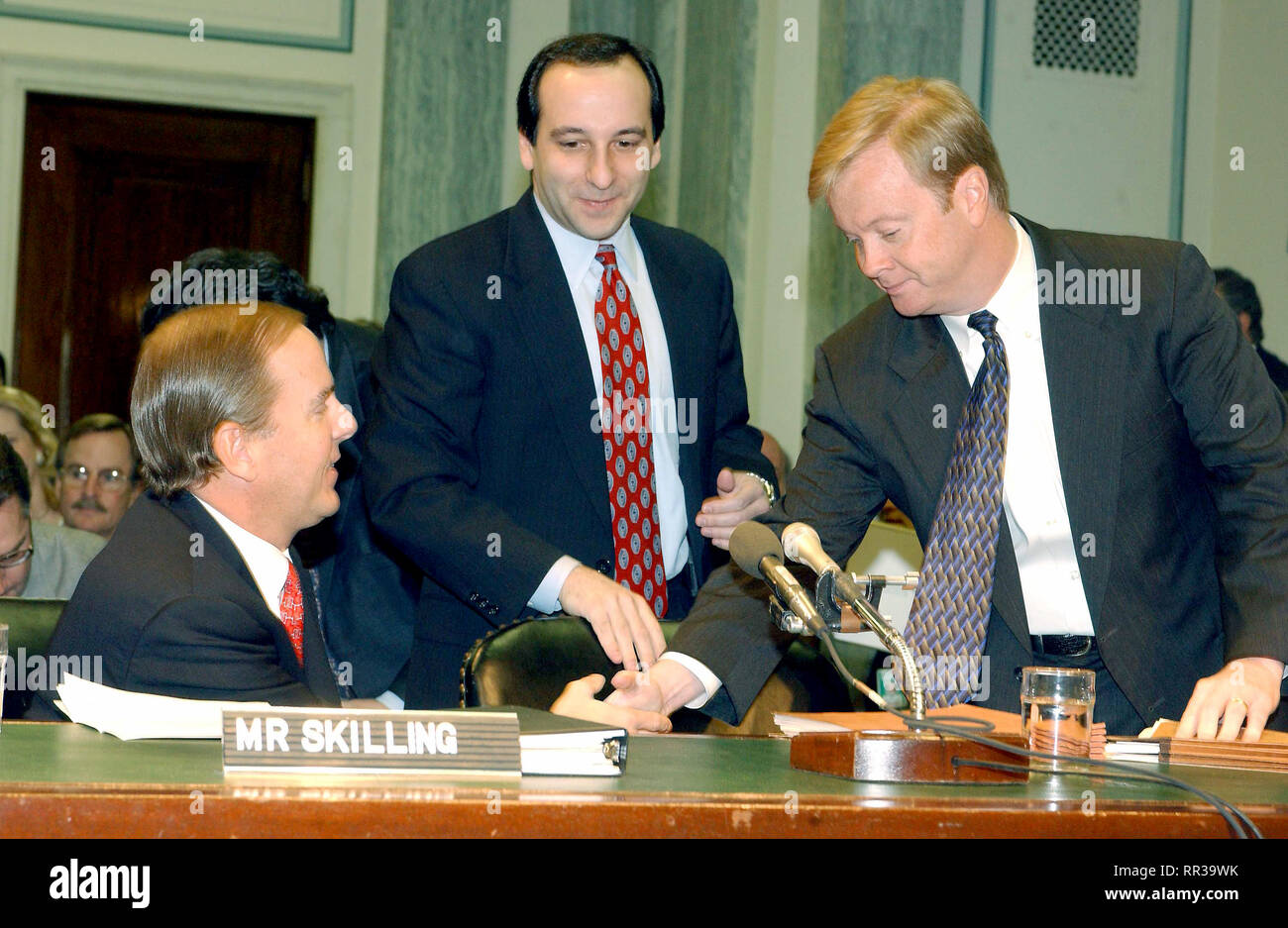 Washington, D.C. - February 26, 2002 -- Jeffrey Skilling and Jeffrey McMahon shake hands prior to testifying before the U.S. Senate Commerce, Science and Transportation Committee to examine certain issues with respect to the collapse of Enron Corporation..Credit: Ron Sachs / CNP /MediaPunch Stock Photo