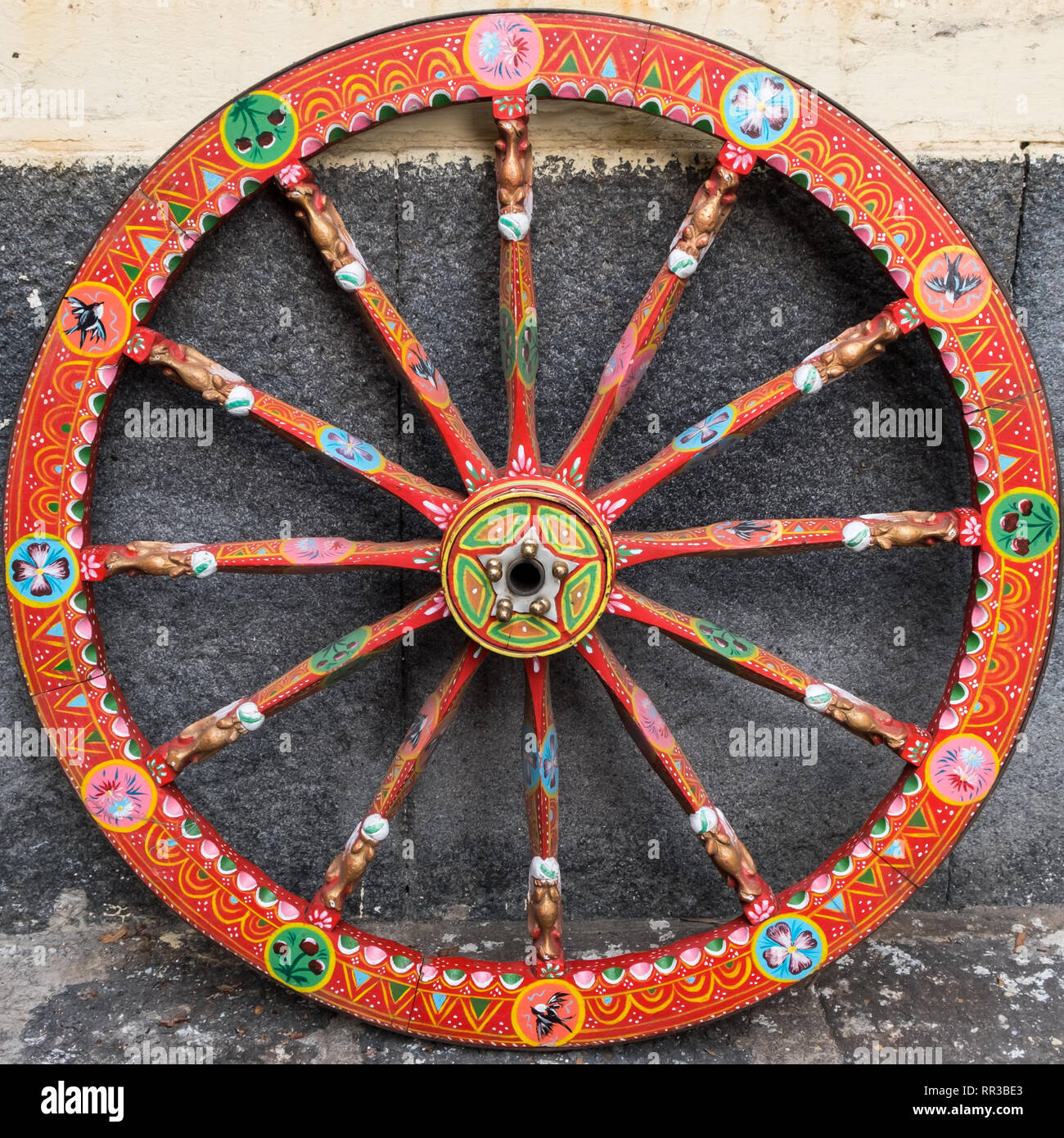 In Acireale, Sicily, a typical paint wheel of a traditional cart named 'carretto siciliano' Stock Photo