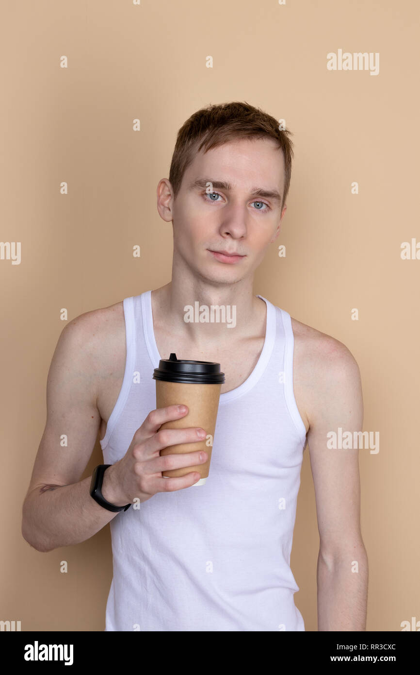 Guy drink from coffee or tea cup Stock Photo Alamy