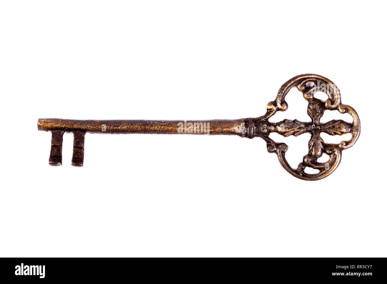 Antique key isolated on white background - photograph Stock Photo - Alamy