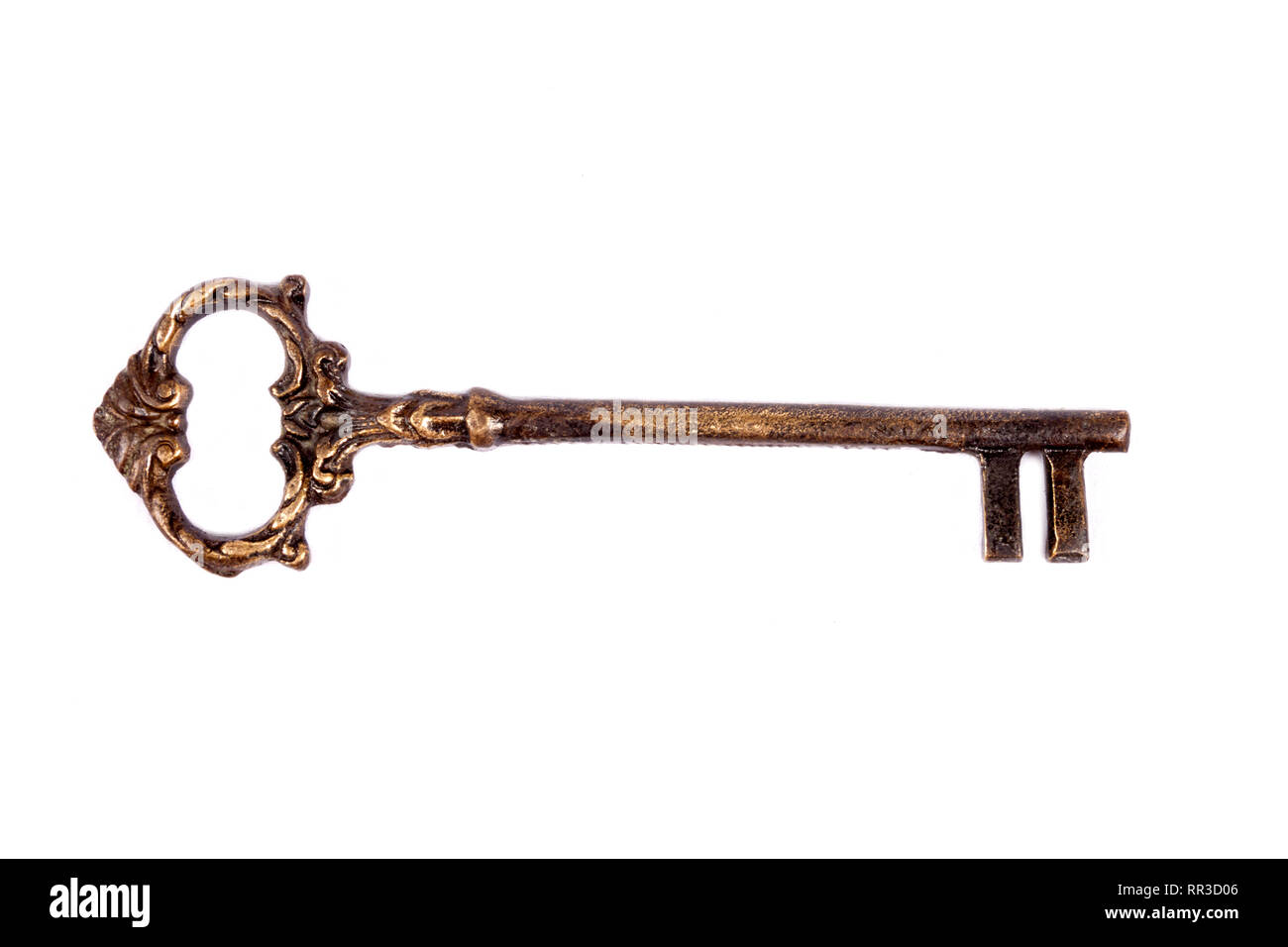 Antique key isolated on white background - photograph Stock Photo - Alamy