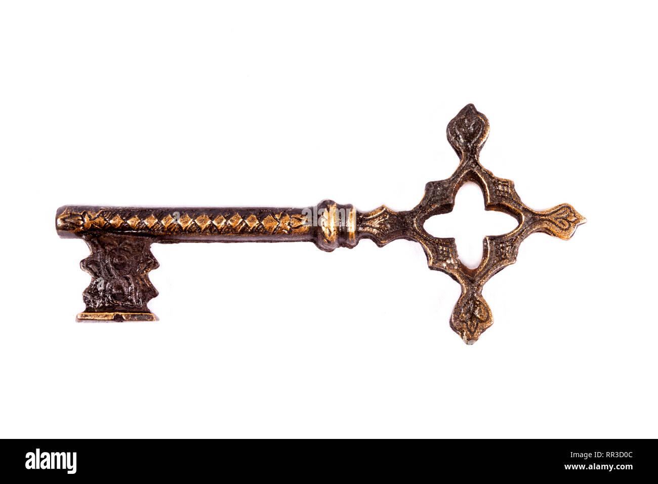 Antique key isolated on white background - photograph Stock Photo - Alamy
