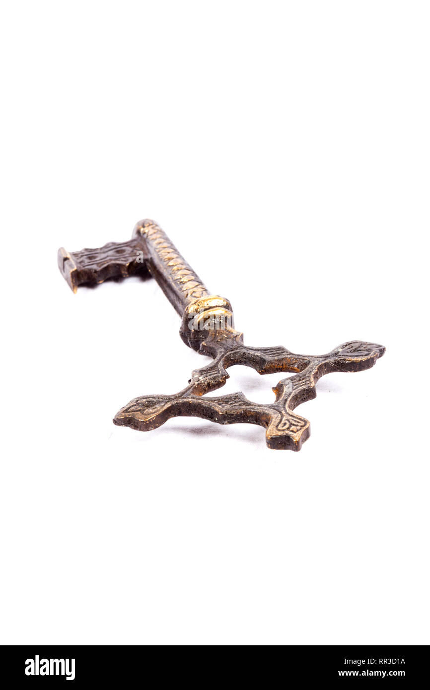 Antique key isolated on white background - photograph Stock Photo - Alamy