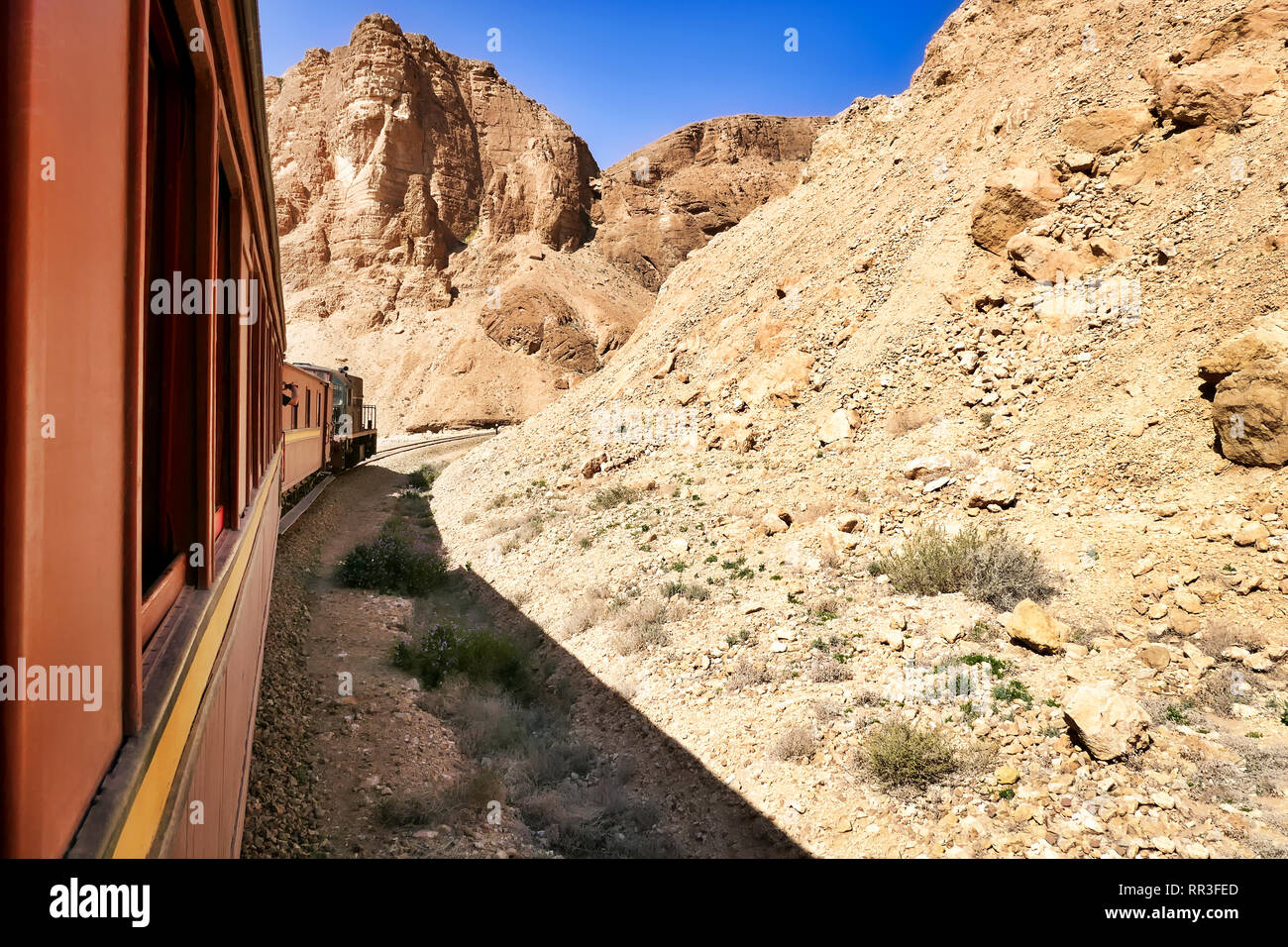 The Lezard Rouge (Red Lizard) is a nostalgic train that runs between Redeyef and Métlaoui. The photo shows it in the Selja gorge. Stock Photo