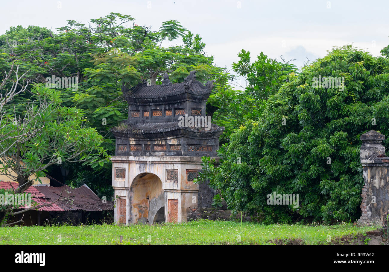 courtyard with gate and trees in Hue citadel Stock Photo