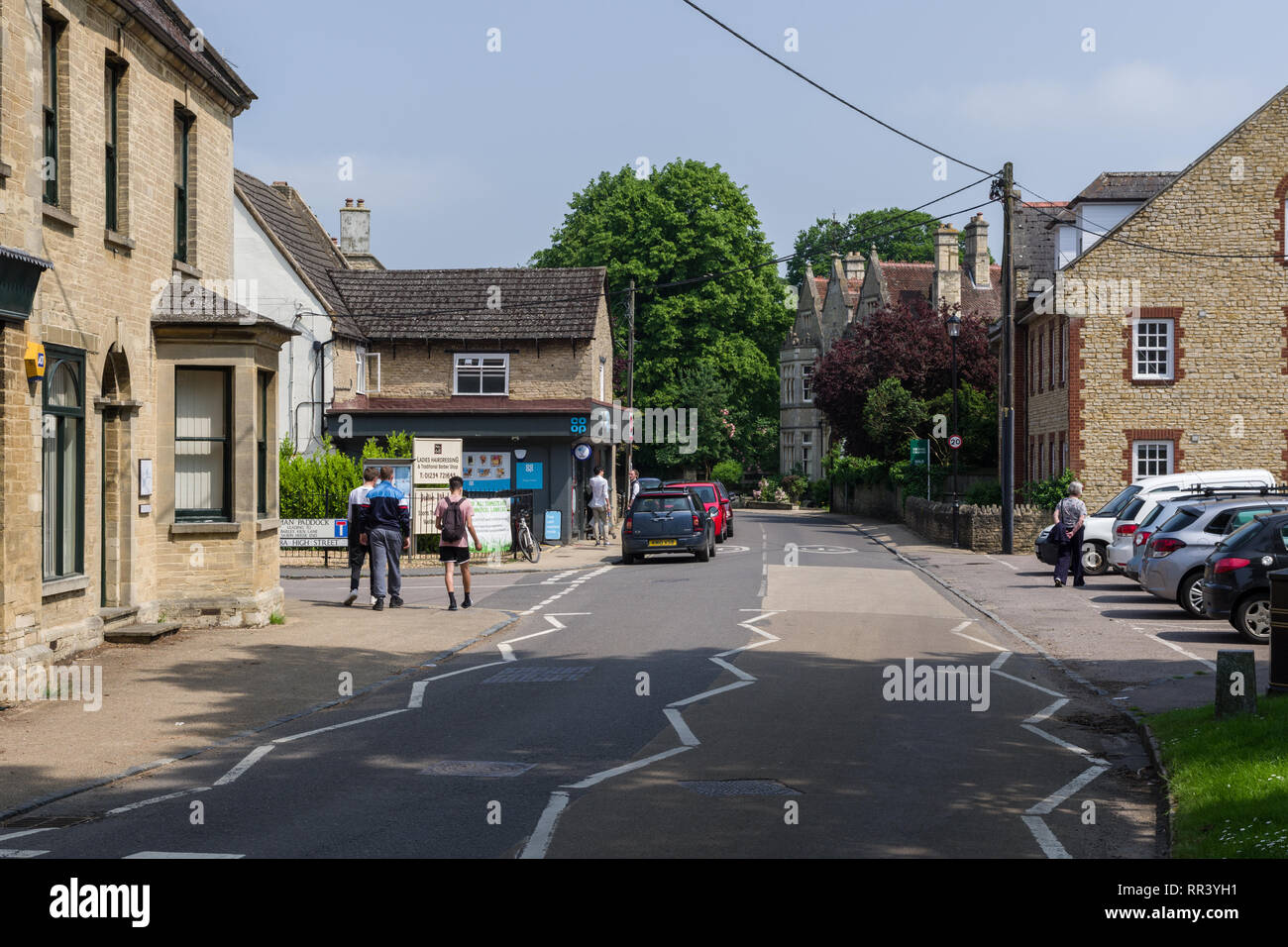 A view of the HIgh Street in the pretty village of Harrold on a sunny Summer day; Bedfordshire, UK Stock Photo