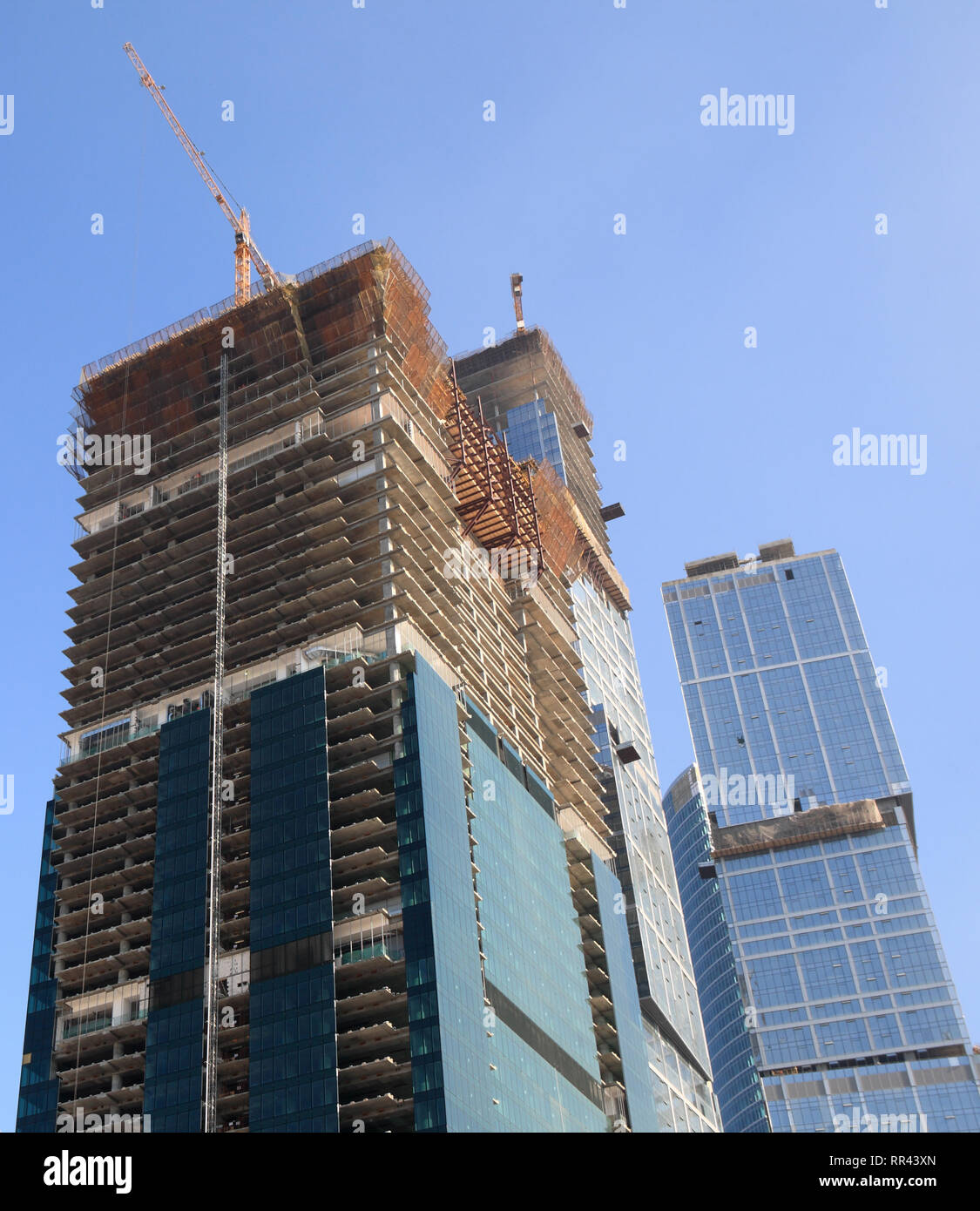 skyscraper develop on sky background at day Stock Photo - Alamy
