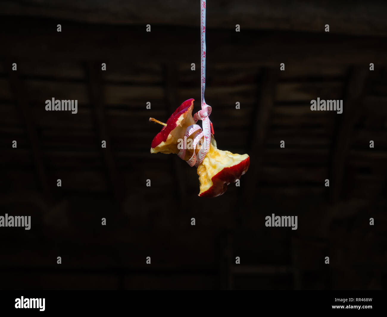 Loop Of Rope For Suicide Hanging On Ceiling Of House Stock Photo