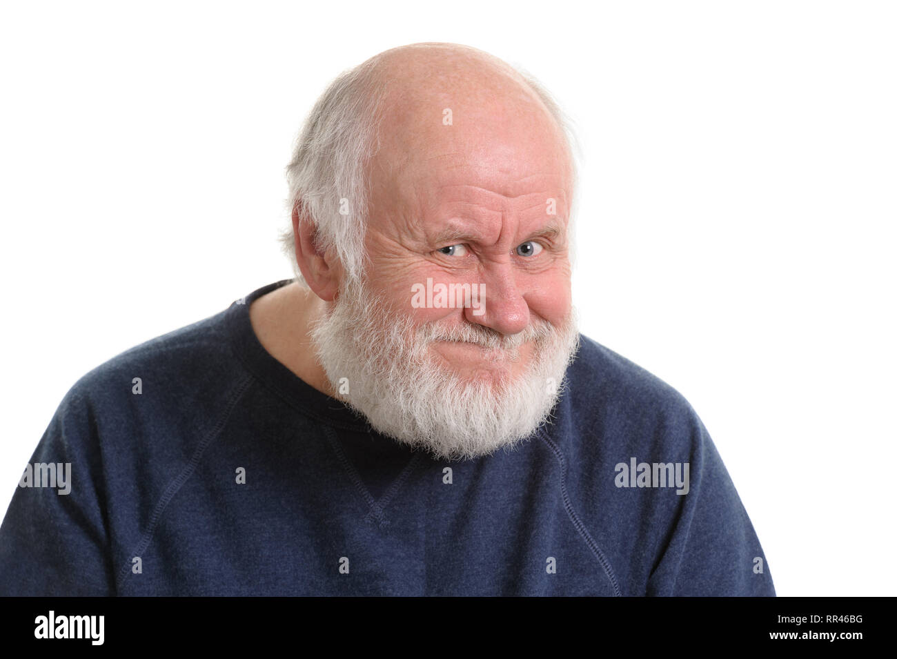 old man with insidious tricky fake smile, isolated on withe Stock Photo