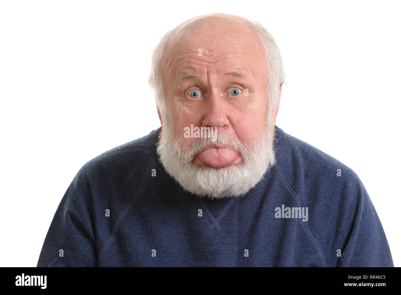 old man sticking out his tongue isolated on white Stock Photo