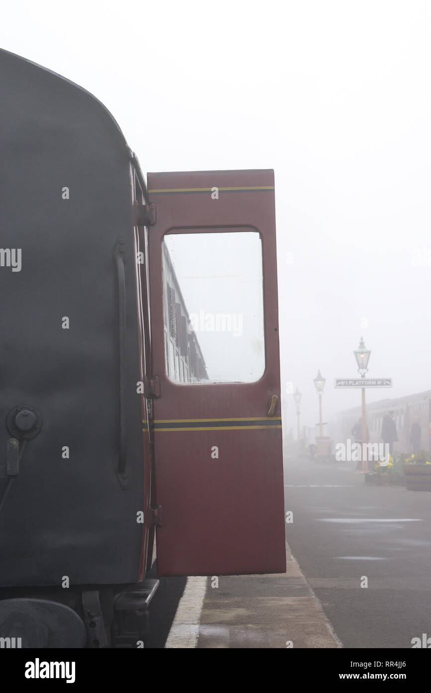Kidderminster, UK. 24th February, 2019. UK weather: despite the thick morning fog across Worcestershire, nothing dampens the spirit of the dedicated volunteers at Severn Valley Railway; the misty morning providing an atmospheric and picturesque start to the day for any passengers boarding these vintage trains. Credit: Lee Hudson/Alamy Live News Stock Photo
