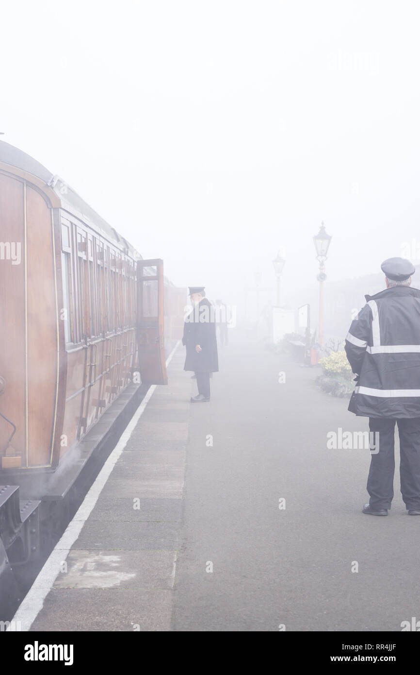 Kidderminster, UK. 24th February, 2019. UK weather: despite the thick morning fog across Worcestershire, nothing dampens the spirit of the dedicated volunteers at Severn Valley Railway; the misty morning providing an atmospheric and picturesque start to the day for any passengers boarding these vintage trains. Credit: Lee Hudson/Alamy Live News Stock Photo