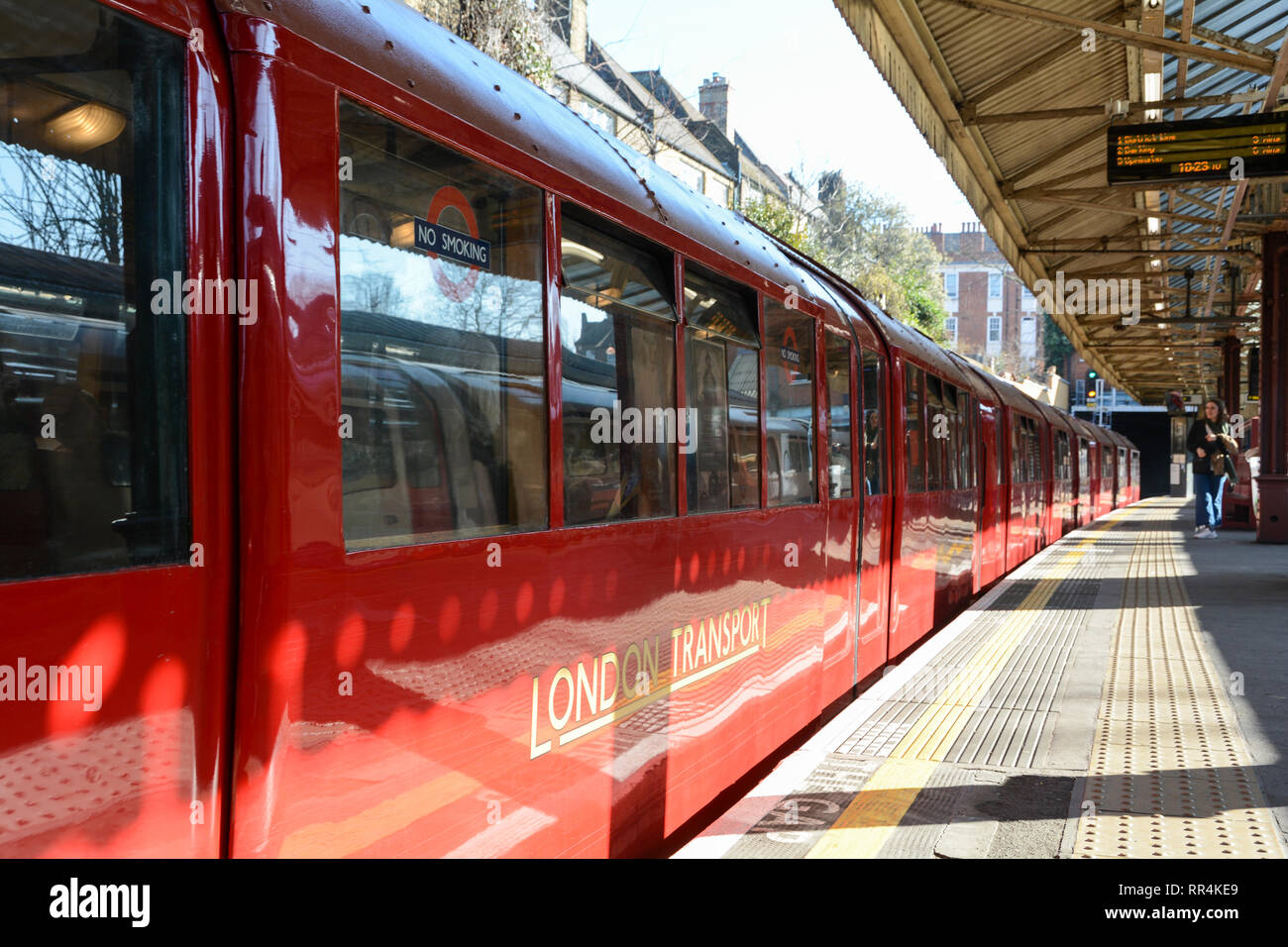 London, England, UK. 24 February 2019.  A beautifully restored art-deco train at Barons Court tube station, on the District line,  in central London © Benjamin John/ Alamy Live News. Stock Photo