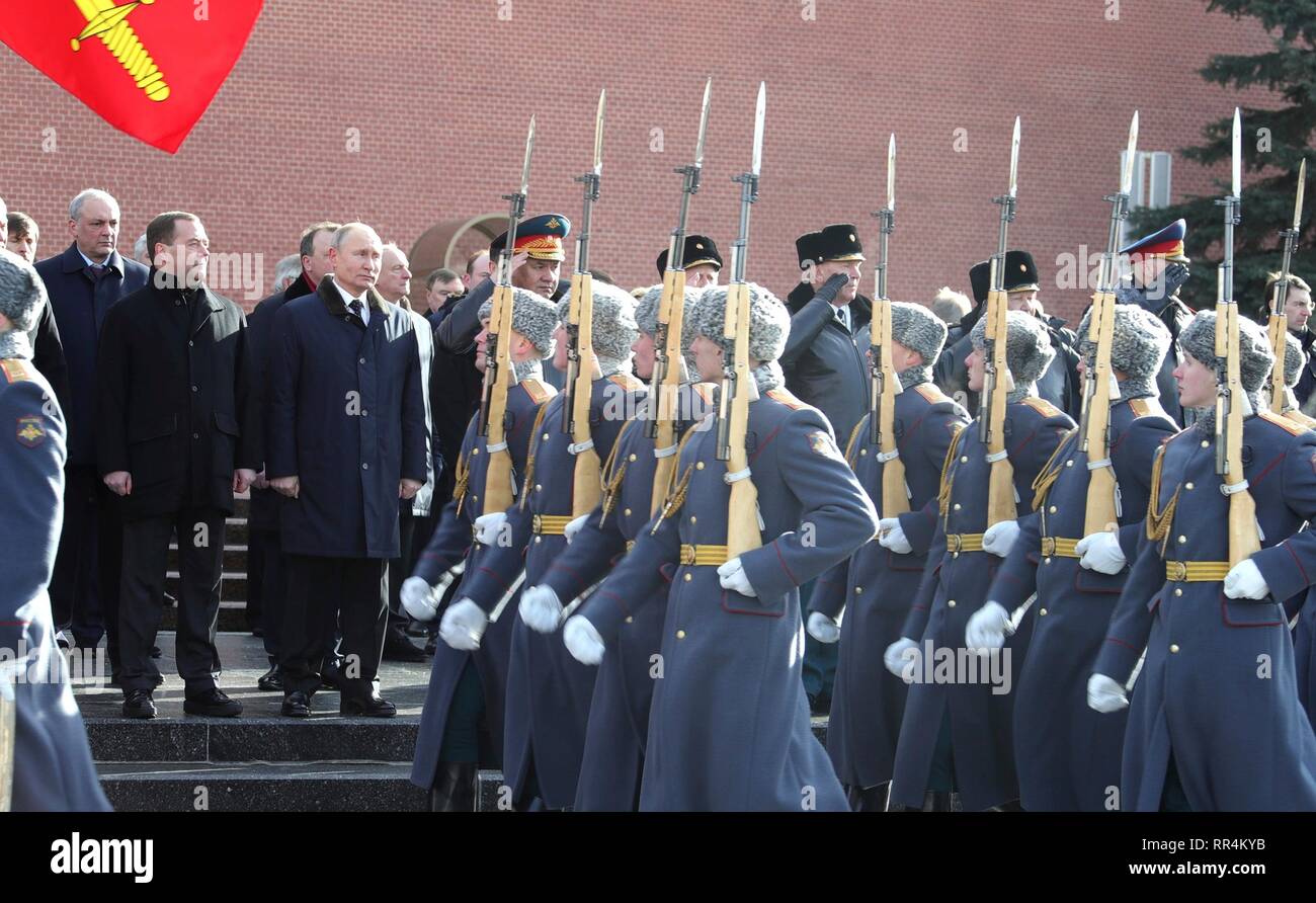 Moscow, Russia. 23rd Feb, 2019. Russian President Vladimir Putin and Prime Minister Dmitry Medvedev attend a wreath ceremony at the Tomb of the Unknown Soldier at the Kremlin Wall to honour the memory of fallen soldiers on Defender of the Fatherland Day February 23, 2019 in Moscow, Russia. Credit: Planetpix/Alamy Live News Stock Photo