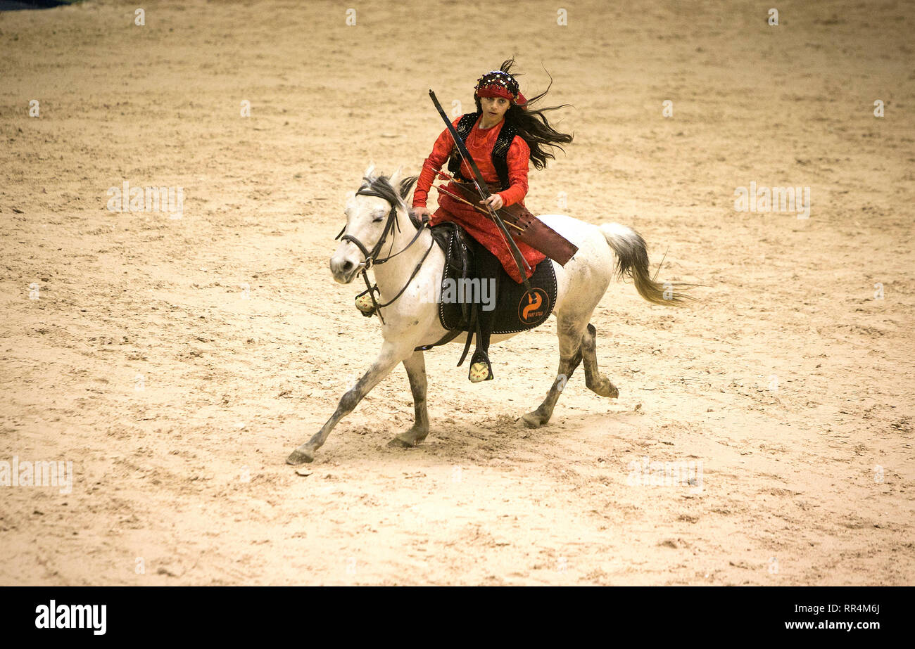 Tehran, Iran. 23rd Feb, 2019. An Iranian female rider performs horse