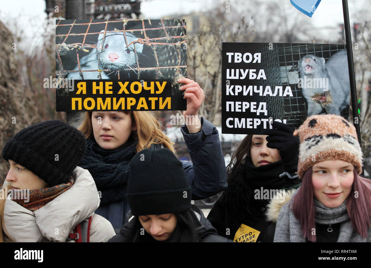 Kiev, Ukraine. 24th Feb, 2019. Ukrainian young women hold placards 'Your fur coat screamed before it dying!' and 'I dont want to die!' during a protest 'Take off the fur forever!' of Kiev, Ukraine. 24th Feb, 2019. Ukrainian young women hold placards 'Your fur coat screamed before it dying!' and 'I dont want to die!' during a protest 'Take off the fur forever!' of