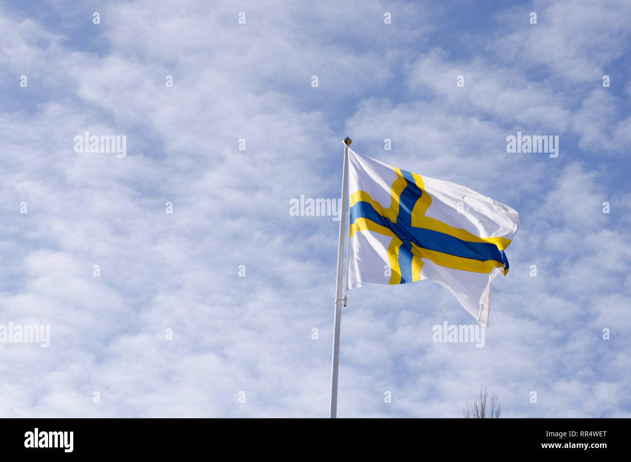 Stockholm, Sweden, 24th Feb 2019. February 24 celebrates the 'Sverigefinnarnas'day in Stockholm and around Sweden. The purpose of the day is to make the Swedish-Finnish minority visible and spread information about their history, language and culture.Here is a picture from Stockholm City Hall that flags with the Sweden-finnish flag in honor of the day. Credit: Jari Juntunen/Alamy Live News Stock Photo