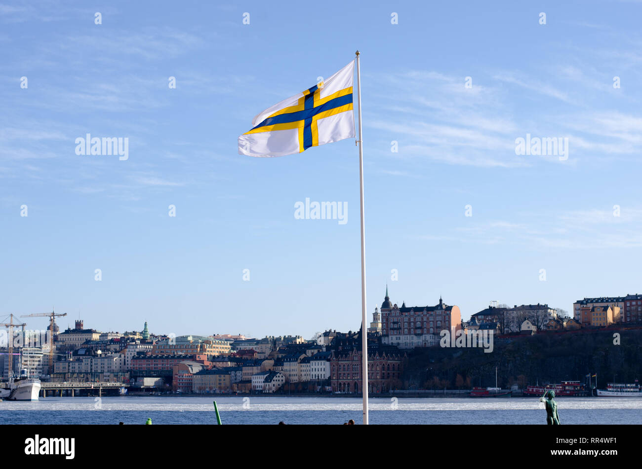 Stockholm, Sweden, 24th Feb 2019. February 24 celebrates the 'Sverigefinnarnas'day in Stockholm and around Sweden. The purpose of the day is to make the Swedish-Finnish minority visible and spread information about their history, language and culture.Here is a picture from Stockholm City Hall that flags with the Sweden-finnish flag in honor of the day. Credit: Jari Juntunen/Alamy Live News Stock Photo