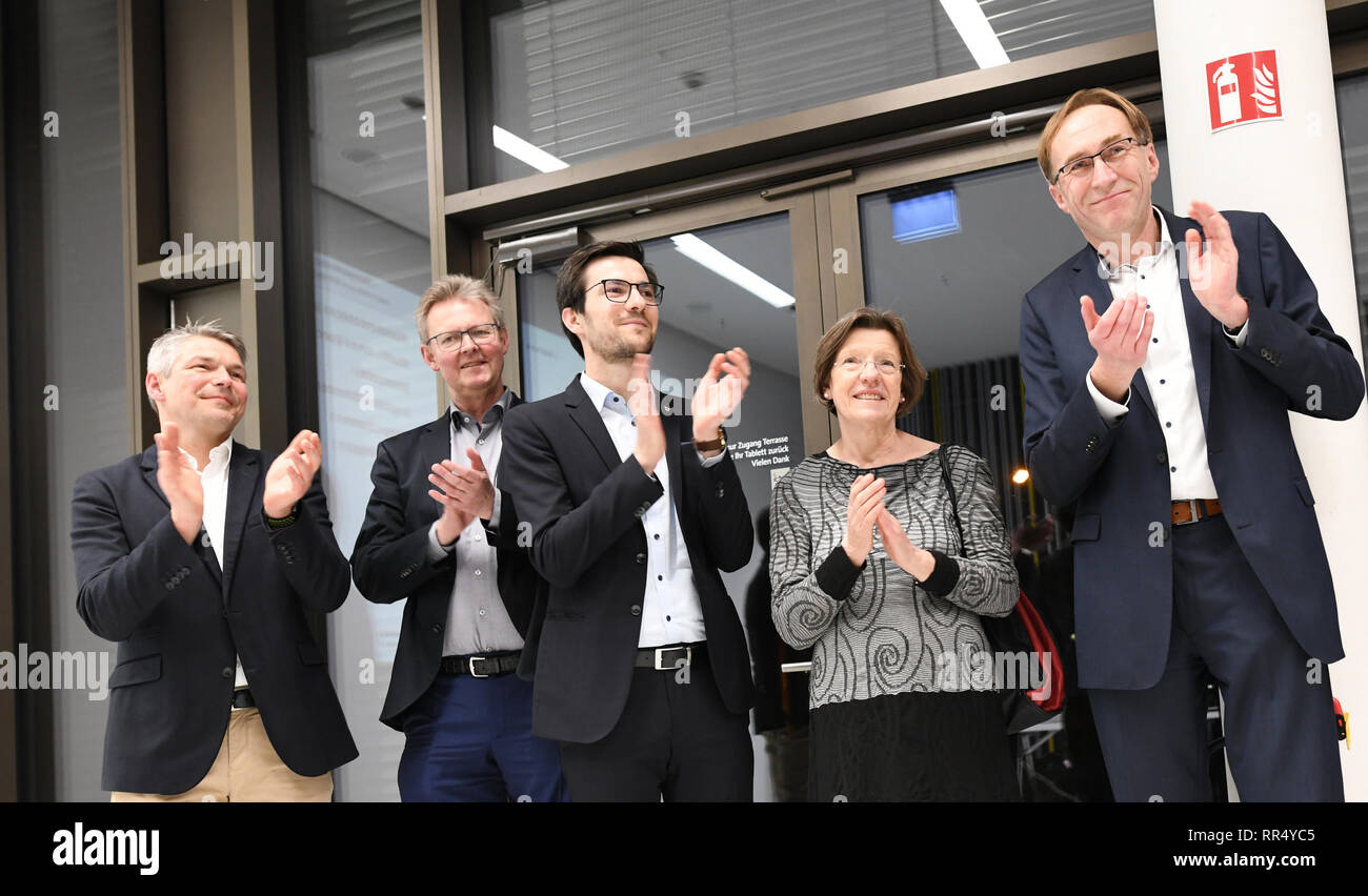 Freiburg, Germany. 24th Feb, 2019. Financial Mayor Stefan Breiter, Social Mayor Ulrich von Kirchbach, Lord Mayor Martin Horn (non-party), Environmental Mayor Gerda Stuchlik and Building Mayor Martin Haag (l-r) applaud after the decision in the referendum on the new Freiburg district project Dietenbach. The planned construction of a new district in Freiburg has received the necessary majority in a referendum. Credit: Patrick Seeger/dpa/Alamy Live News Stock Photo