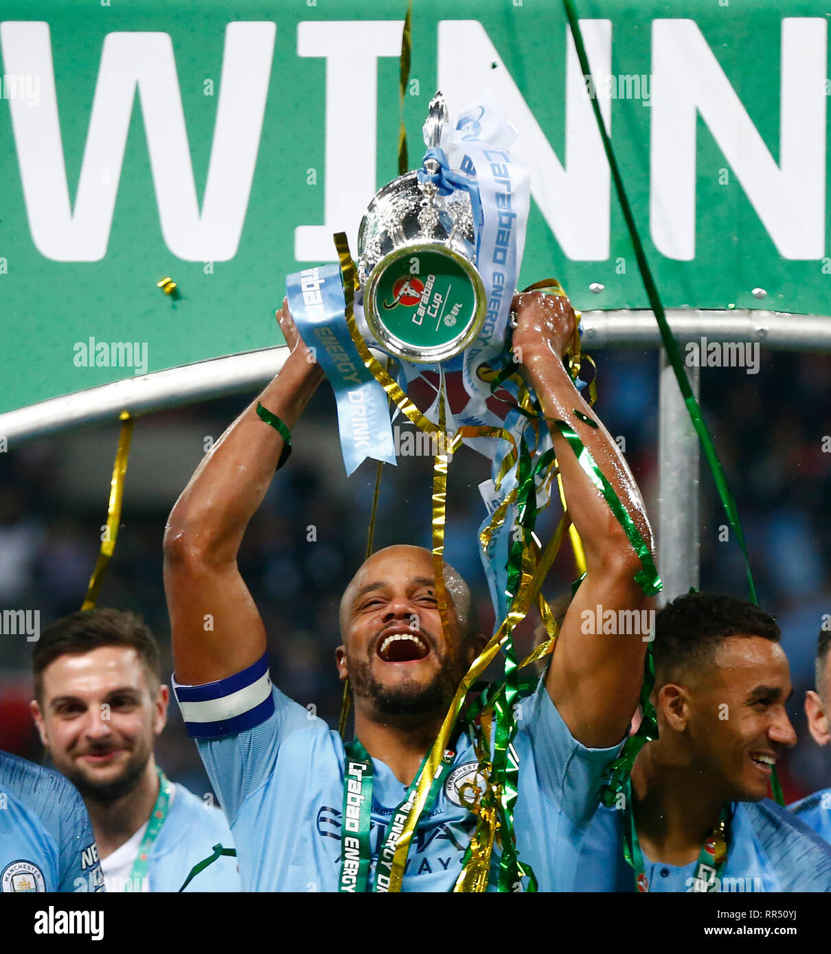 London, England - Febuary 23, 2019 Manchester City's Vincent Kompany with Trophy during during Carabao Cup Final between Chelsea and Manchester City at Wembley stadium , London, England on 23 Feb 2019 Credit Action Foto Sport  FA Premier League and Football League images are subject to DataCo Licence. Editorial use ONLY. No print sales. No personal use sales. NO UNPAID USE Stock Photo