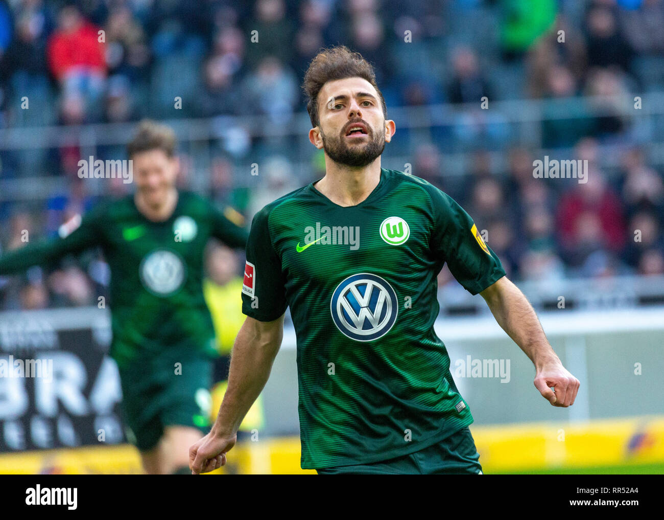 sports, football, Bundesliga, 2018/2019, Borussia Moenchengladbach vs VfL Wolfsburg 0-3, Stadium Borussia Park, goal scorer Admir Mehmedi (Wolfsburg) rejoicing at his 0-2 goal, DFL REGULATIONS PROHIBIT ANY USE OF PHOTOGRAPHS AS IMAGE SEQUENCES AND/OR QUASI-VIDEO Stock Photo