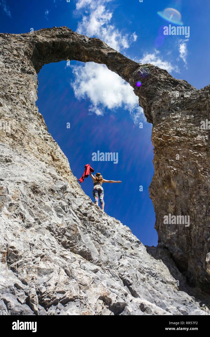 Powerful girl hiking in French Alps. Aiguille Percee, France Stock Photo