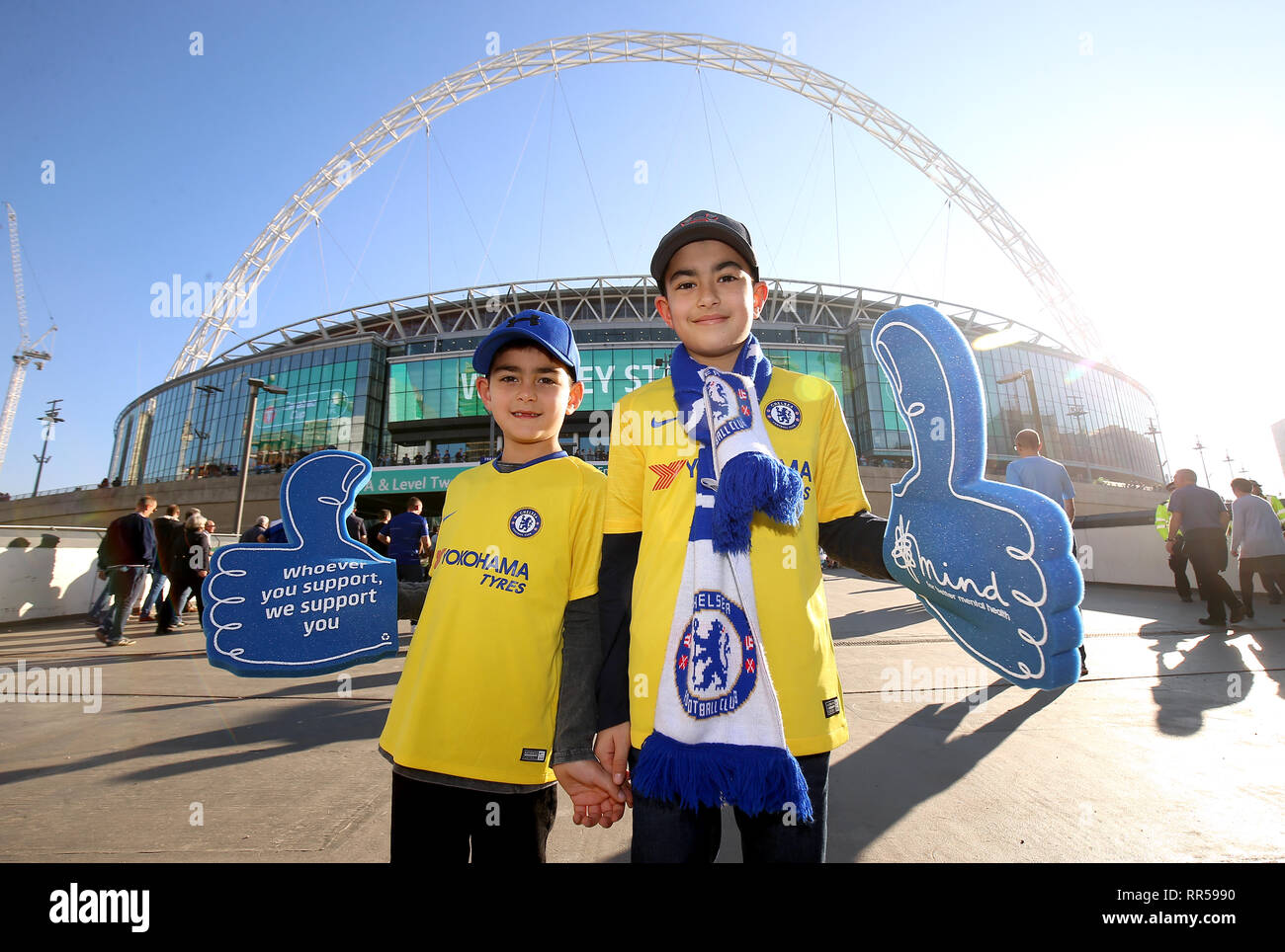A general view of Chelsea supporters arriving at Wembley Stadium with Mind charity foam fingers prior to the beginning of the Carabao Cup Final at Wembley Stadium, London. Stock Photo