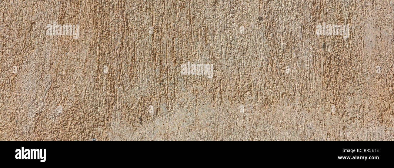 Plastered wall background, beige brown color, rough texture, banner Stock Photo