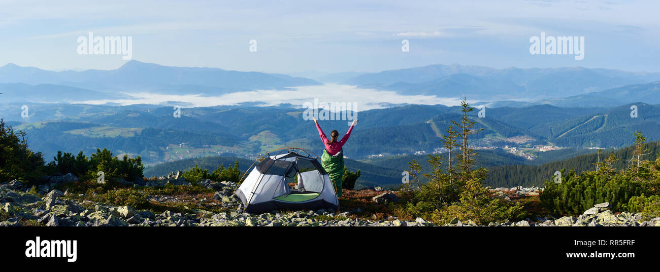 Happy female hiker resting hi-res stock photography and images - Alamy