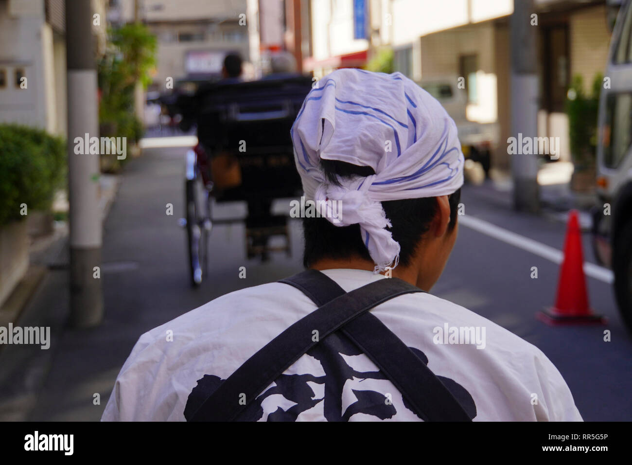Rickshaw runner in Tokyo, Japan Stock Photo