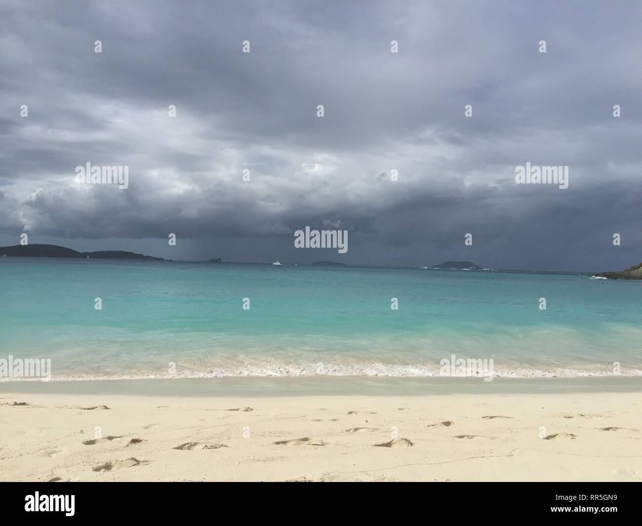 Storm coming over Trunk Bay Stock Photo Alamy