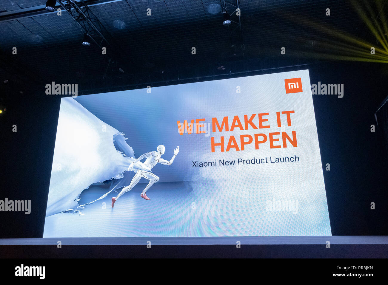 Advertising presentation of Xiaomi New Product Launch is seen on a stage  screen during the event. The Chinese company Xiaomi dedicated to the  manufacture, development, design and sales of smart phones has