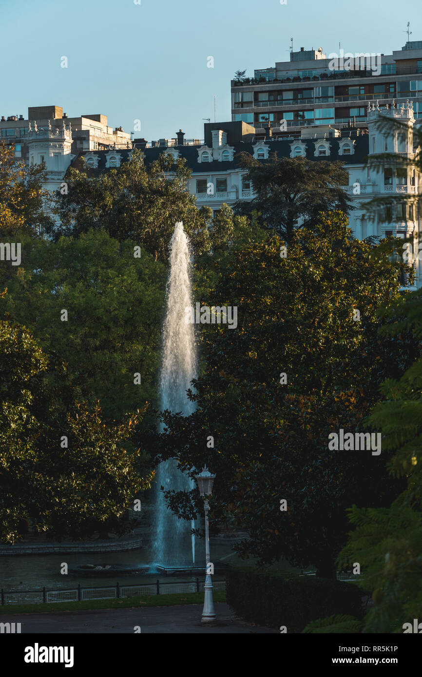 Enjoying the view of a beautiful fountain in Casilda Iturrizar park, Bilbao, Spain Stock Photo