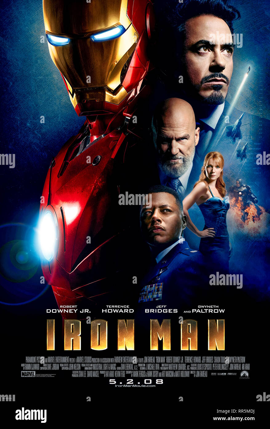 Iron Man (2008) directed by Jon Favreau and starring Robert Downey Jr., Gwyneth Paltrow and Terrence Howard. Tony Stark creates a unique power source and suit to keep himself alive and escape imprisonment. Stock Photo