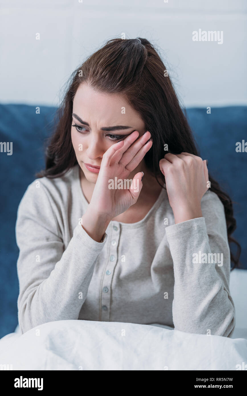 Wiping her tears hires stock photography and images Alamy