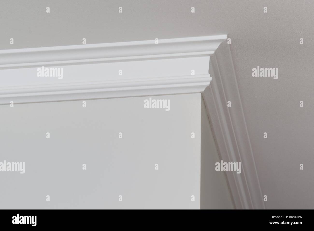 Ceiling moldings in the interior, a detail of corner Stock Photo Alamy
