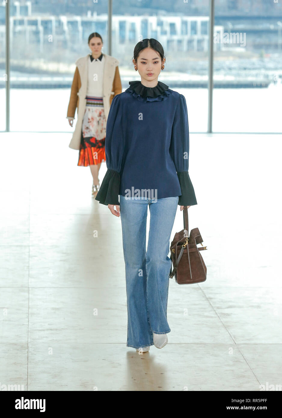 New York, NY - February 10, 2019: Hyun Ji Shin walks runway for Tory Burch  collection during Fall/Winter 2019 Fashion Week at Pier 17 Stock Photo -  Alamy