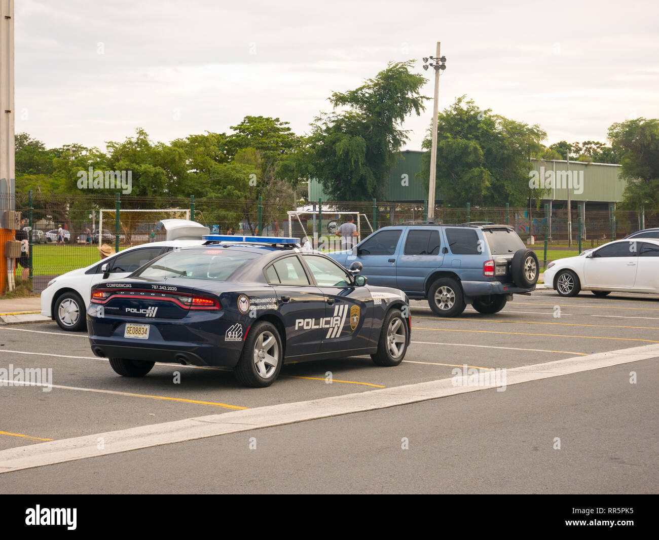 San Juan, Puerto Rico. January 2019. Police car parked near a park in