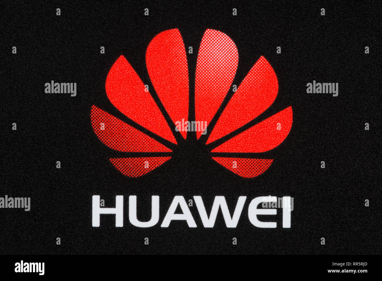 The Huawei logo as seen on a power battery fitted in one of its electronic products (Editorial use only). Stock Photo