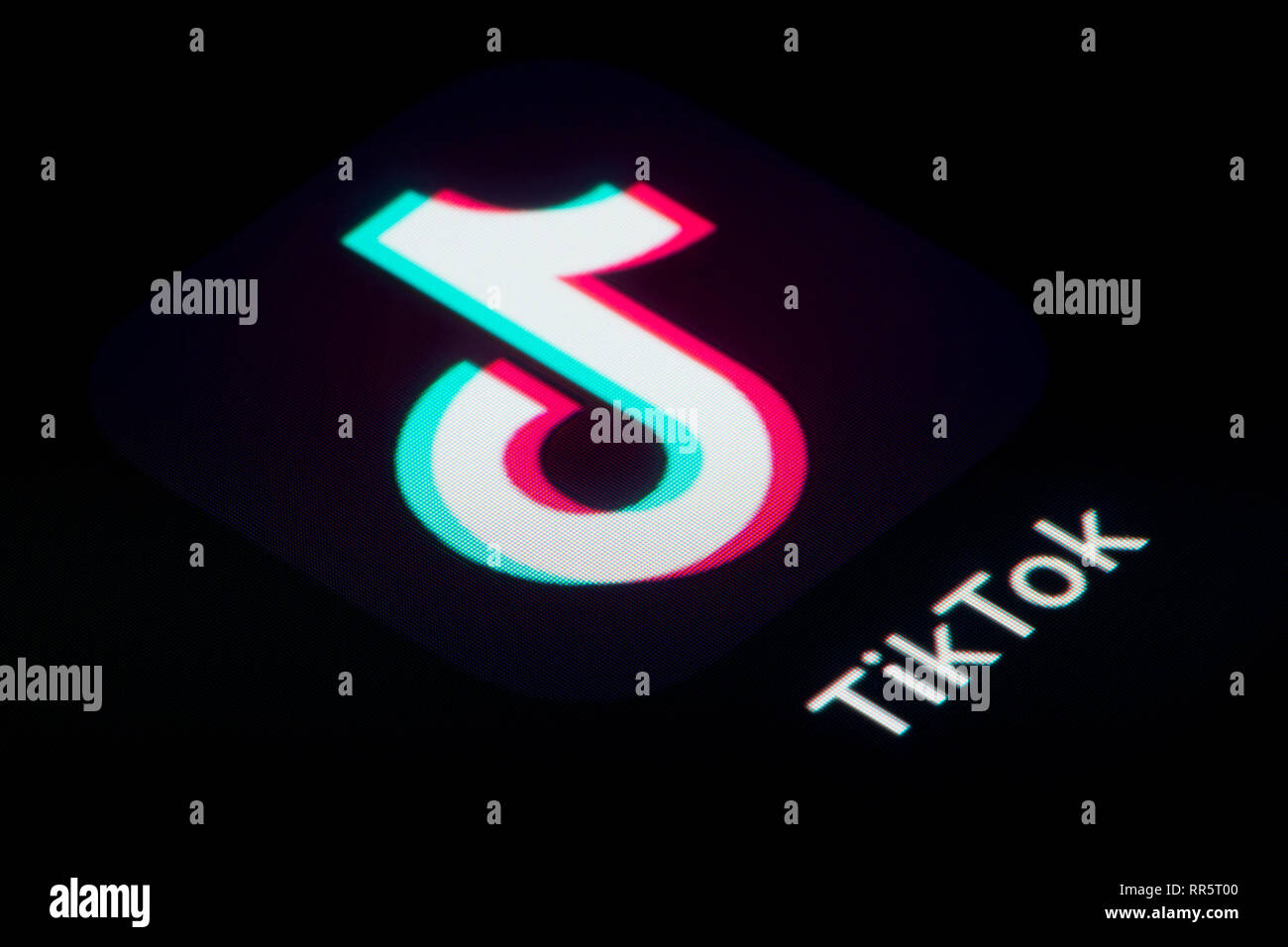 A close-up shot of the TikTok app icon, as seen on the screen of a smart phone (Editorial use only) Stock Photo